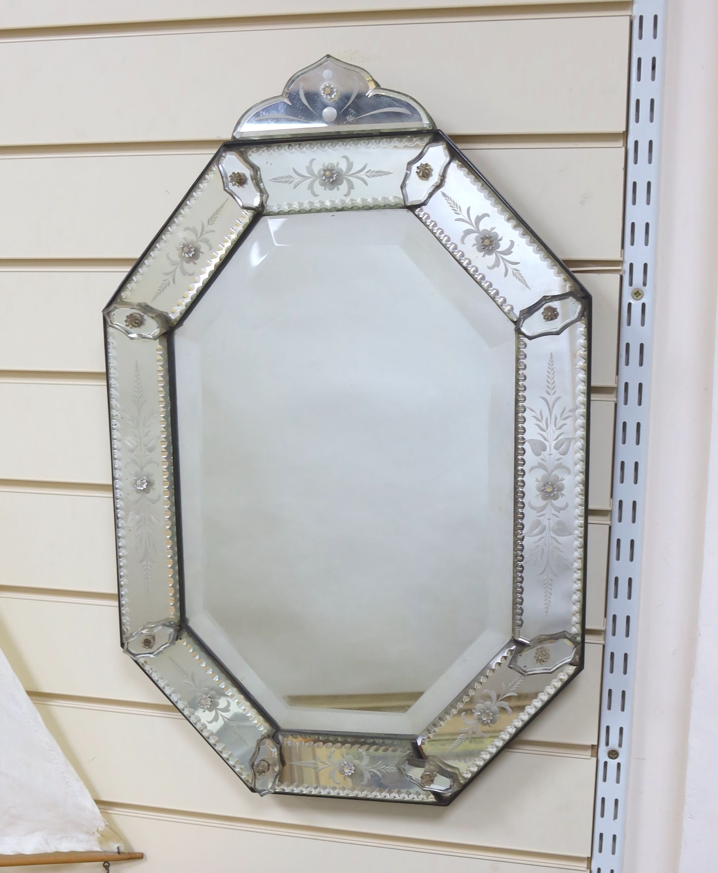 A 19th century Venetian glass mirror, 40 cms wide x 61 cms high.